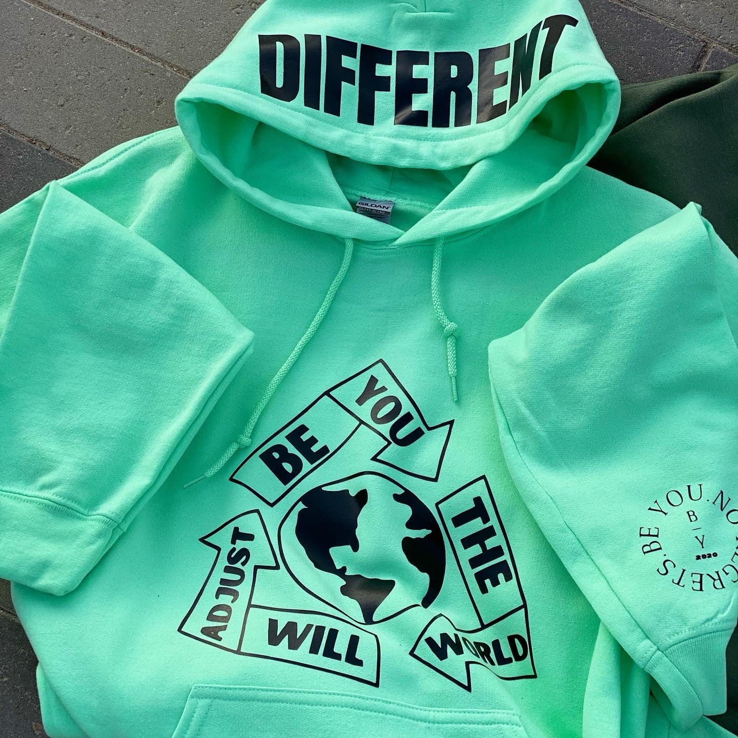 “The 🌎 Will Adjust” Hoodie