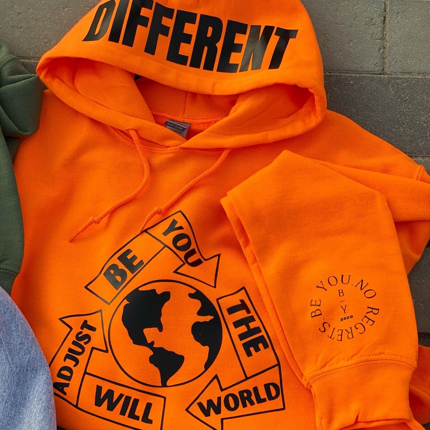 “The 🌎 Will Adjust” Hoodie